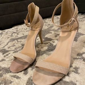 Nude strappy heels with embellishment